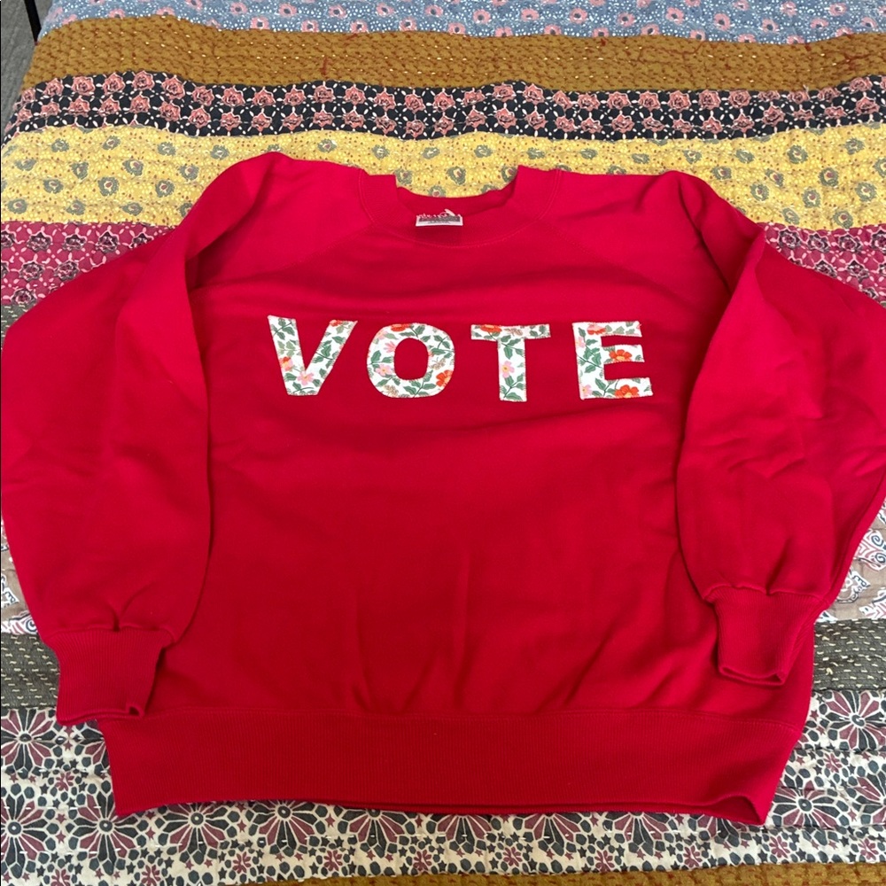 Red Sweater with 'VOTE' Design